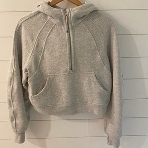 Grey Lululemon Scuba 1/4 zip crop sweatshirt.